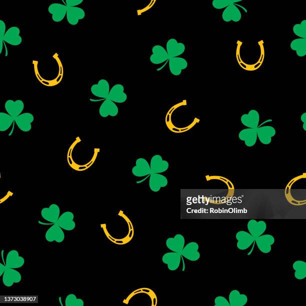 little clover leaves and horseshoes seamless pattern - golden horseshoe stock illustrations