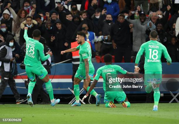 Denis Bouanga of Saint-Etienne celebrates his goal with teammates during the Ligue 1 Uber Eats match between Paris Saint-Germain and AS Saint-Etienne...