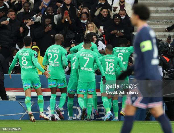 Denis Bouanga of Saint-Etienne celebrates his goal with teammates and supporters during the Ligue 1 Uber Eats match between Paris Saint-Germain and...