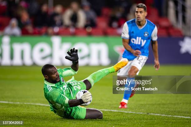 Bill Hamid of D.C. United makes a save in front of Michael Barrios of Charlotte FC during the second half of the MLS game at Audi Field on February...