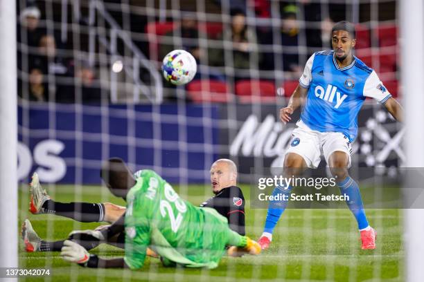 Michael Barrios of Charlotte FC shoots the ball against Bill Hamid of D.C. United during the second half of the MLS game at Audi Field on February...