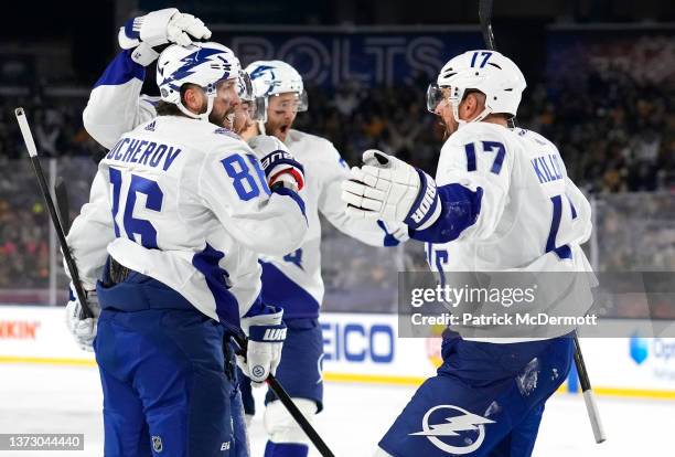 Nikita Kucherov of the Tampa Bay Lightning celebrates his goal with teammates after scoring during the second period of the 2022 NHL Stadium Series...