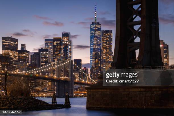 the brooklyn bridge, freedom tower and lower manhattan - lower east side manhattan stock pictures, royalty-free photos & images