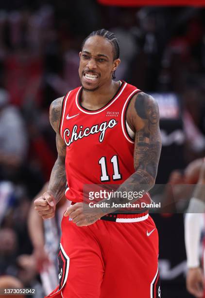 DeMar DeRozan of the Chicago Bulls celebrates after hitting a shot against the Memphis Grizzlies at the United Center on February 26, 2022 in...