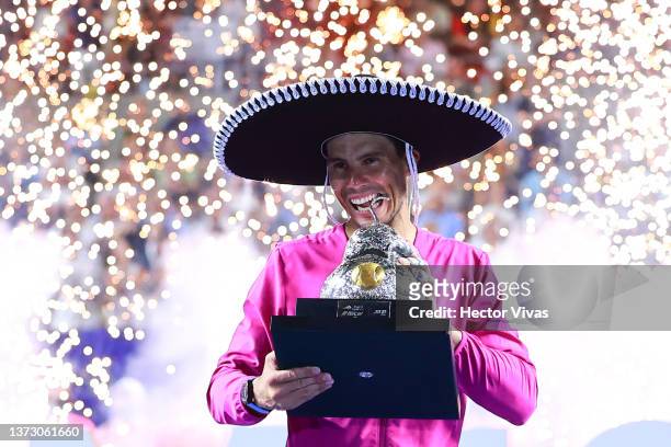 Rafael Nadal of Spain celebrates with the champion trophy after winning the final match between Rafael Nadal of Spain and Cameron Norrie of Great...