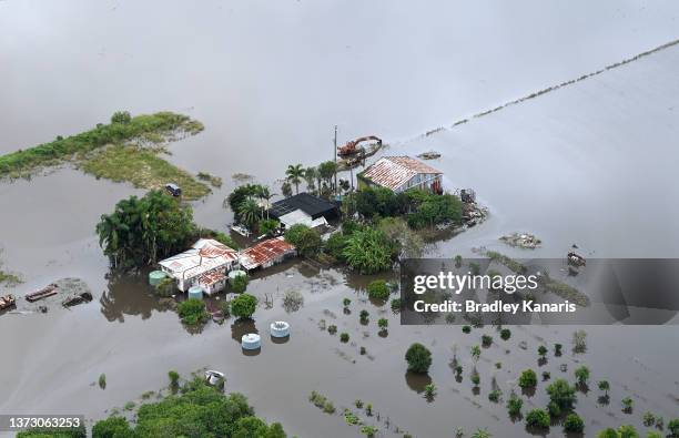 Farm house is surrounded by floodwaters in the town of Bli Bli on February 27, 2022 in Sunshine Coast, Australia. Parts of South-East Queensland are...