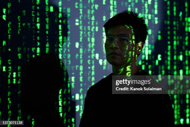 digtal identity with man in digital torrent - hologram projection stock pictures, royalty-free photos & images