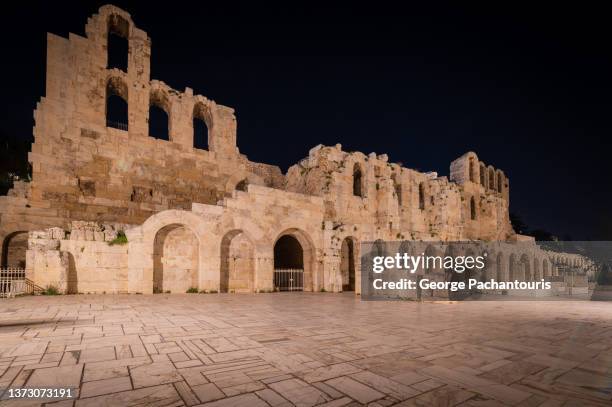 theater of herodes atticus in athens, greece at night - odeon ancient building stock pictures, royalty-free photos & images