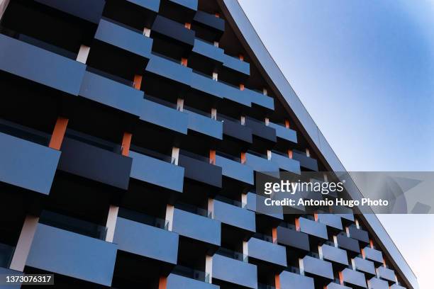 modern building with square balconies seen from below. modern architecture. - façade immeuble photos et images de collection