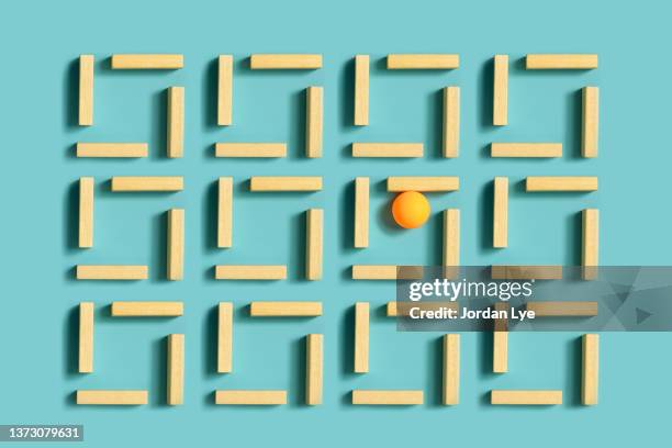 standing out from the crowd concept - jenga stock pictures, royalty-free photos & images