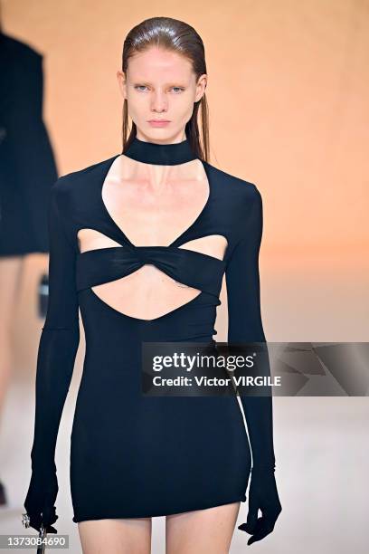 Model walks the runway during the Ambush Ready to Wear Fall/Winter 2022-2023 fashion show as part of the Milan Fashion Week on February 26, 2022 in...