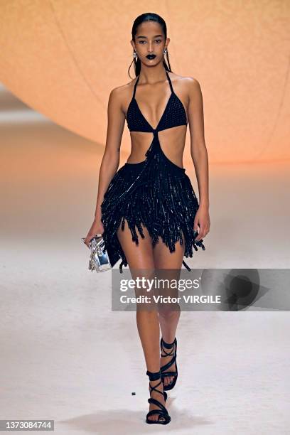 Model walks the runway during the Ambush Ready to Wear Fall/Winter 2022-2023 fashion show as part of the Milan Fashion Week on February 26, 2022 in...