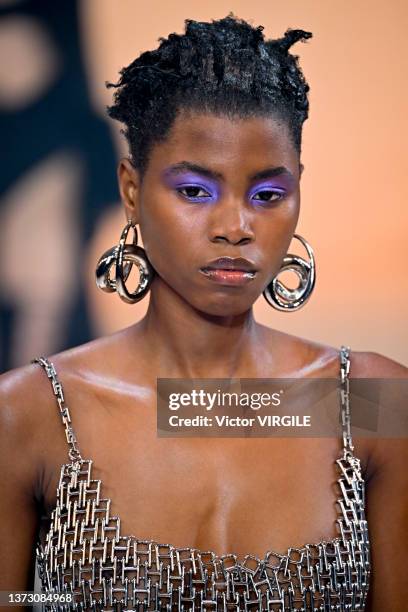 Model walks the runway during the Ambush Ready to Wear Fall/Winter 2022-2023 fashion show as part of the Milan Fashion Week on February 26, 2022 in...