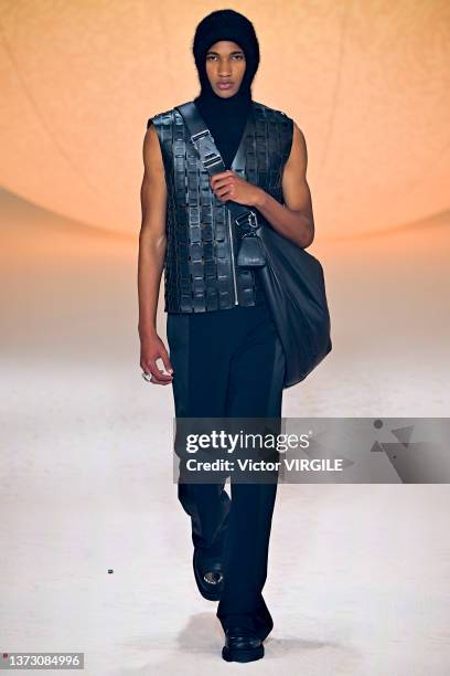 Model walks the runway during the Ambush Ready to Wear Fall/Winter 2022-2023 fashion show as part of the Milan Fashion Week on February 26, 2022 in...