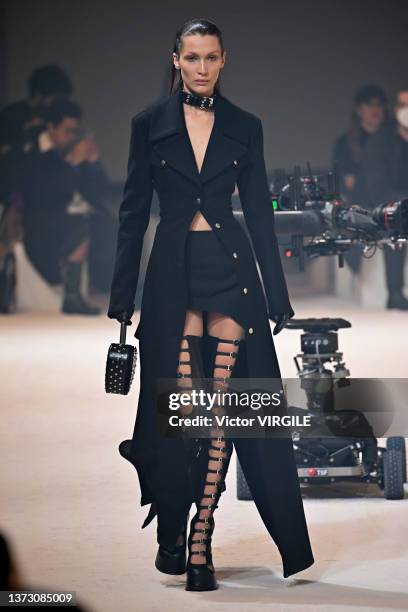 Bella Hadid walks the runway during the Ambush Ready to Wear Fall/Winter 2022-2023 fashion show as part of the Milan Fashion Week on February 26,...