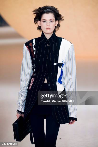 Model walks the runway during the Ambush Ready to Wear Fall/Winter 2022-2023 fashion show as part of the Milan Fashion Week on February 26, 2022 in...