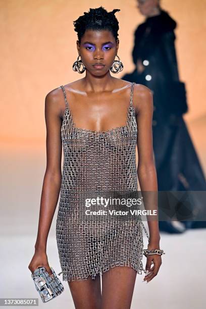 Model walks the runway during the Ambush Ready to Wear Fall/Winter 2022-2023 fashion show as part of the Milan Fashion Week on February 26, 2022 in...