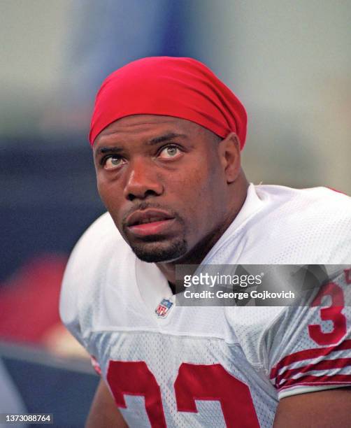 Running back Ricky Ervins of the San Francisco 49ers looks on from the sideline during a game against the Indianapolis Colts at the RCA Dome on...