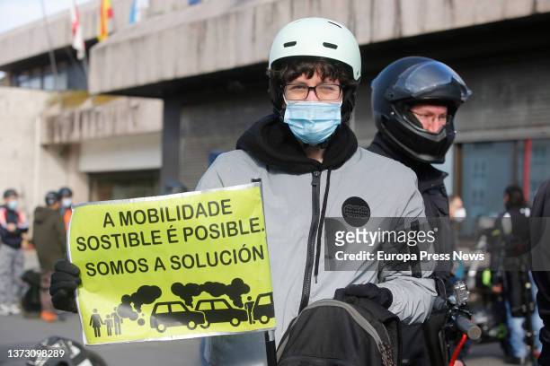 Demonstrators, with their scooters, against the resolution of personal mobility vehicles, in Prazo do Rei, on 27 February, 2022 in Vigo, Pontevedra,...