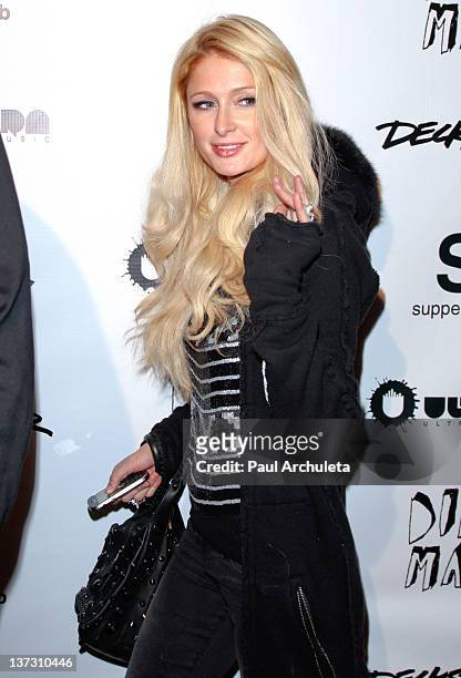 Reality TV Personality Paris Hilton attends Steve Aoki's "Wonderland" record release party and red carpet event at SupperClub Los Angeles on January...