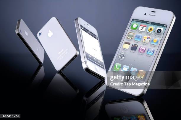 Set of white Apple iPhone 4 models, May 12, 2011.