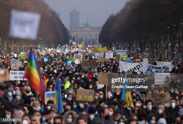 Tens of thousands of people gather in Tiergarten park to protest against the ongoing war in Ukraine on February 27, 2022 in Berlin, Germany. Battles...