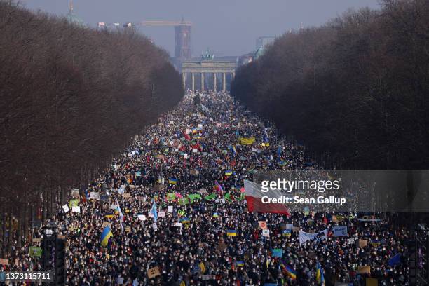 Tens of thousands of people gather in Tiergarten park to protest against the ongoing war in Ukraine on February 27, 2022 in Berlin, Germany. Battles...