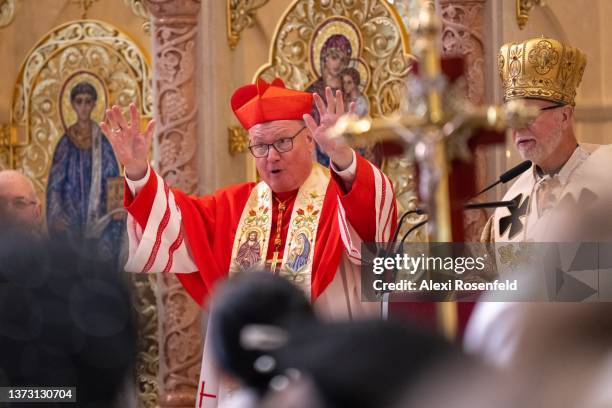 Cardinal Timothy Dolan blesses worshipers at mass at St. George�’s Church on February 27, 2022 in New York City. His Eminence, Cardinal Timothy Dolan,...