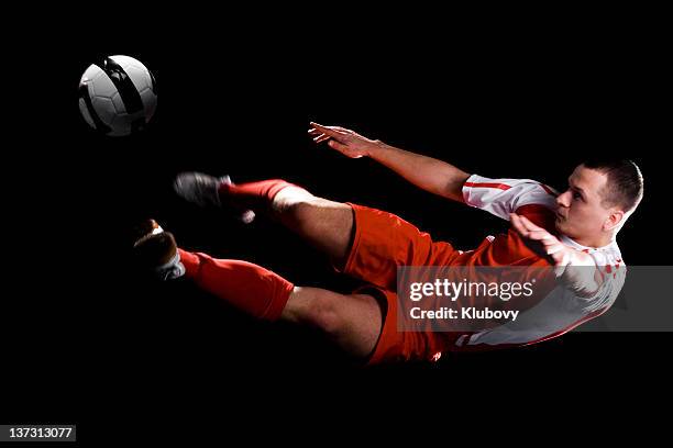 bicycle kick - bicycle kick stock pictures, royalty-free photos & images