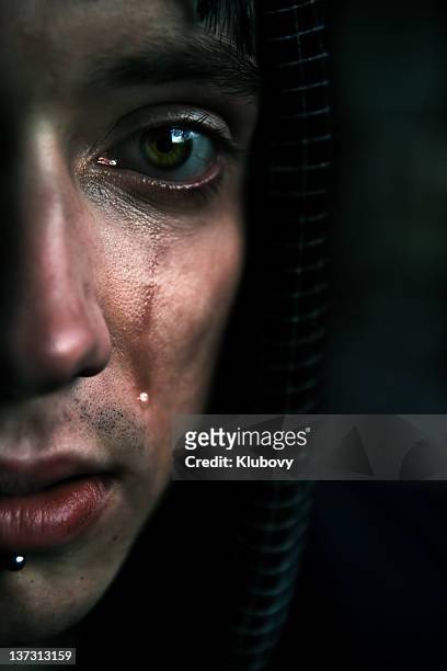 teardrop - man cry touching stock pictures, royalty-free photos & images
