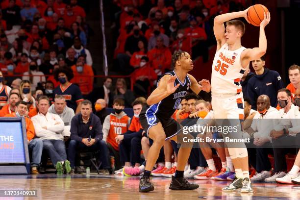 Wendell Moore Jr. #0 of the Duke Blue Devils guards Buddy Boeheim of the Syracuse Orange during the second half at the Carrier Dome on February 26,...