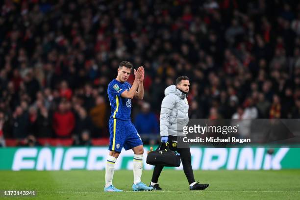 Cesar Azpilicueta of Chelsea goes off with an injury during the Carabao Cup Final match between Chelsea and Liverpool at Wembley Stadium on February...
