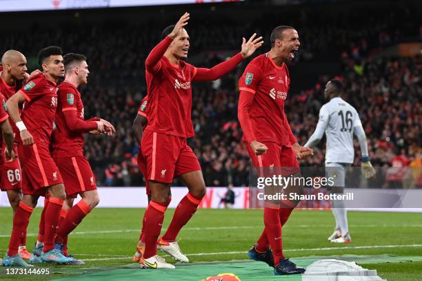 Joel Matip celebrates with Virgil van Dijk of Liverpool after scoring a goal which was later disallowed by VAR during the Carabao Cup Final match...