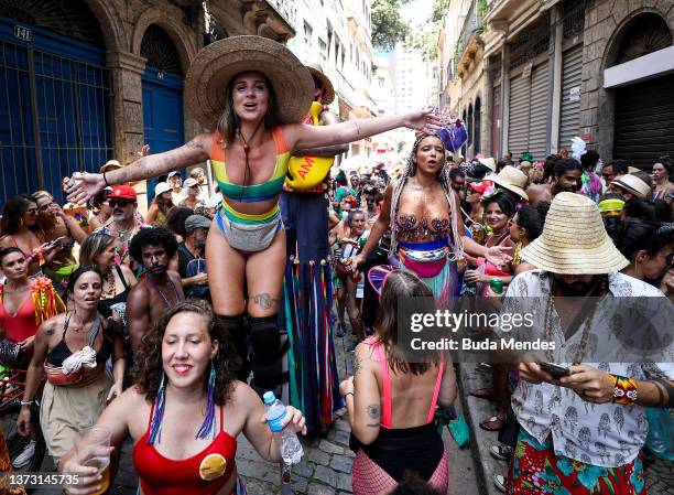 People part of carnival troupe celebrates Carnival Sunday in the downtown area on February 27, 2022 in Rio de Janeiro, Brazil. With the traditional...