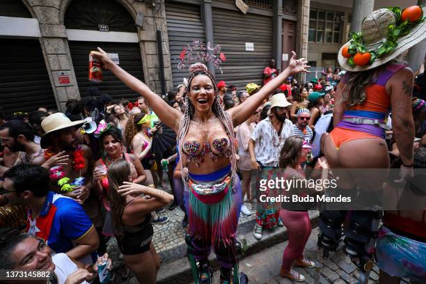 People part of carnival troupe celebrates Carnival Sunday in the downtown area on February 27, 2022 in Rio de Janeiro, Brazil. With the traditional...