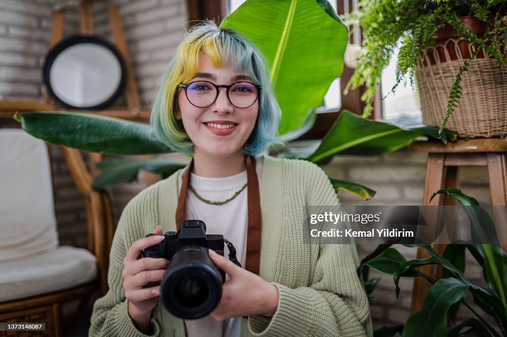 Portrait of a Young smiling Photographer