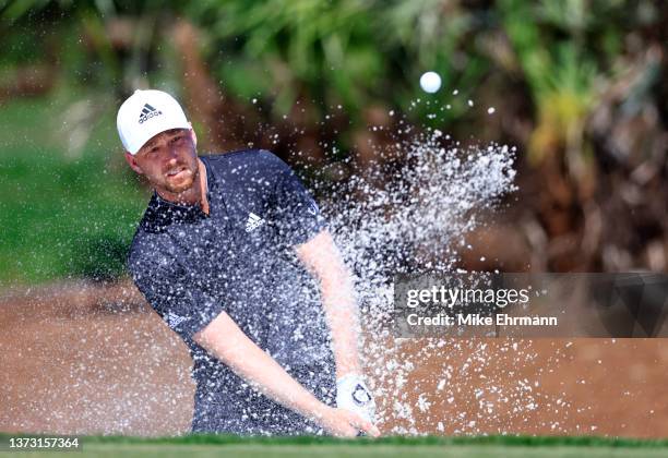 Daniel Berger plays a shot from a bunker on the third hole during the final round of The Honda Classic at PGA National Resort And Spa on February 27,...