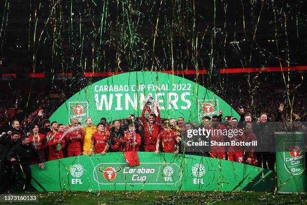 Jordan Henderson of Liverpool lifts the Carabao Cup trophy following victory in the Carabao Cup Final match between Chelsea and Liverpool at Wembley...