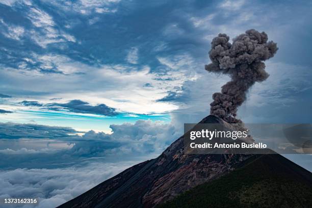 volcan de fuego erupting - agua stock pictures, royalty-free photos & images