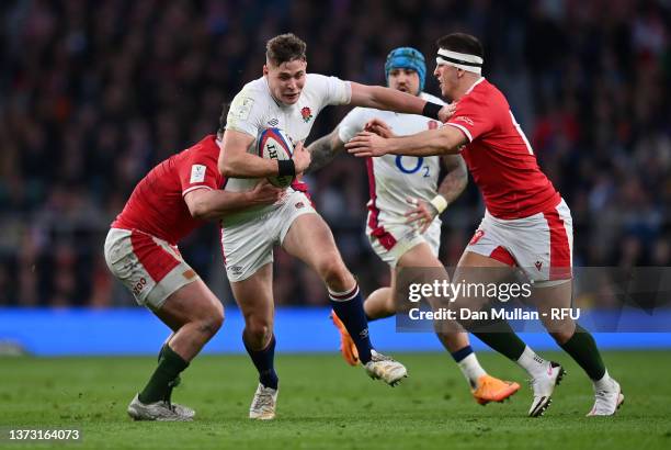 Freddie Steward of England takes on Ryan Elias and Owen Watkin of Wales during the Guinness Six Nations Rugby match between England and Wales at...