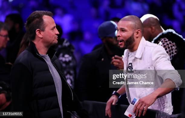 Chris Eubank Jr. Speaks with Boxing Promoter Nisse Sauerland during the Okolie v Cieslak fight night at The O2 Arena on February 27, 2022 in London,...