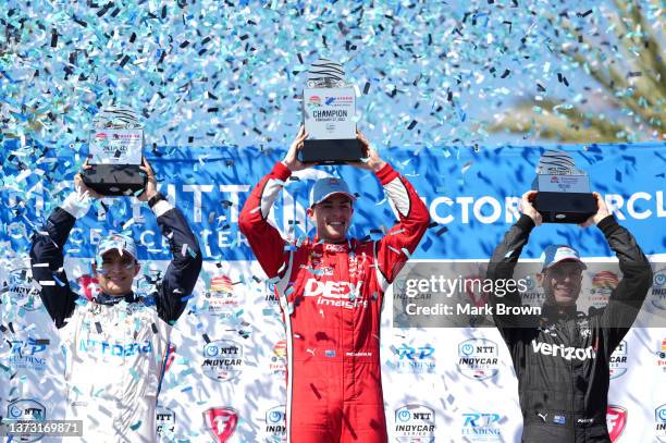 Second place finisher, Alex Palou of Spain and driver of the NTT DATA Chip Ganassi Racing Honda, Champion,Scott McLaughlin of New Zealand and driver...