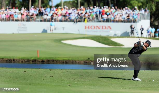 Shane Lowry of Ireland plays his second shot on the eighth hole during the final round of The Honda Classic at PGA National Resort And Spa on...