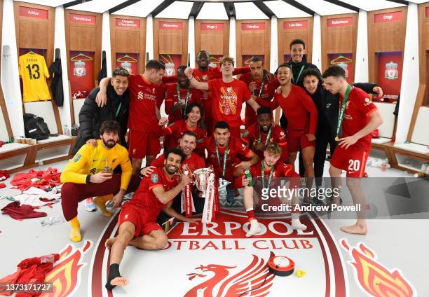Liverpool team celebrating in≈ the dressing room at the end of the Carabao Cup Final match between Chelsea and Liverpool at Wembley Stadium on...