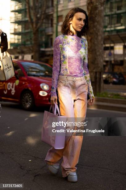 Mary Leest is seen ahead of the MSGM fashion show wearing a see through floral blouse during the Milan Fashion Week Fall/Winter 2022/2023 on February...