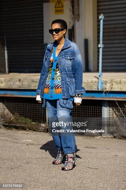 Tamu McPherson is seen ahead of the Dsquared2 fashion show wearing denim jacket and pants during the Milan Fashion Week Fall/Winter 2022/2023 on...