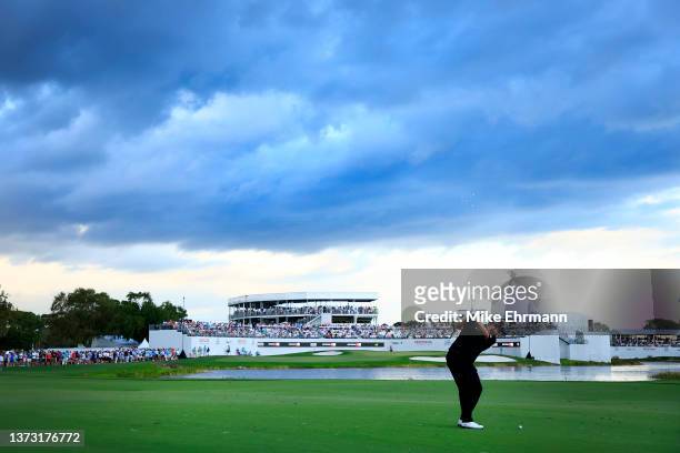 Shane Lowry of Ireland plays his shot on the 16th hole during the final round of The Honda Classic at PGA National Resort And Spa on February 27,...