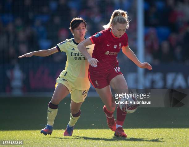 Ceri Holland of Liverpool and Mana Iwabuchi of Arsenal in action during the Vitality Women's FA Cup Fifth Round match between Liverpool Women and...