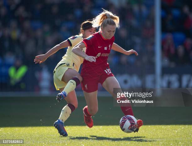 Ceri Holland of Liverpool and Mana Iwabuchi of Arsenal in action during the Vitality Women's FA Cup Fifth Round match between Liverpool Women and...