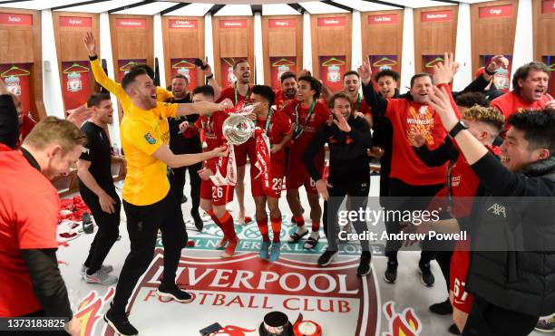 Liverpool players in the dressing room with the EFL Carabao Cup trophy at the end of the Carabao Cup Final match between Chelsea and Liverpool at...